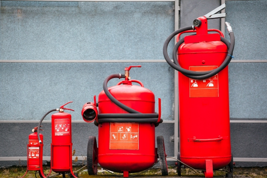 fire extinguishers, different shapes and sizes