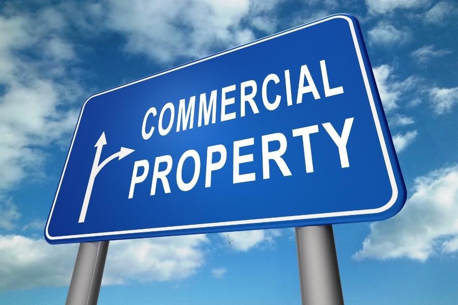 sign showing directions to commercial property